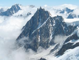 The Aiguille du Midi 3842m peak in the Mont Blanc massif of the French Alps